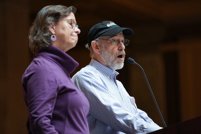 Ken and Krisztina Inskeep, parents of a transgender son, speak during a Rally to Protect Trans Youth organized by the ACLU of Indiana on Saturday, April 1, 2023, at the Statehouse in Indianapolis.