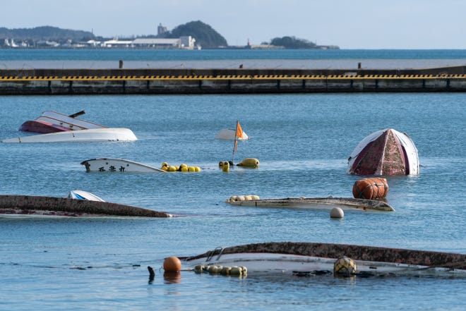Overturned fishing boats are seen at a port in Suzu, Japan, that was hit by a tsunami following an earthquake on Jan. 4, 2024. A series of major earthquakes have reportedly killed at least 78 people, injured dozens more, and destroyed a large amount of homes. The earthquakes, the biggest measuring 7.1 magnitude, hit the areas around Ishikawa, Toyama, and Niigata in central Japan on Monday.