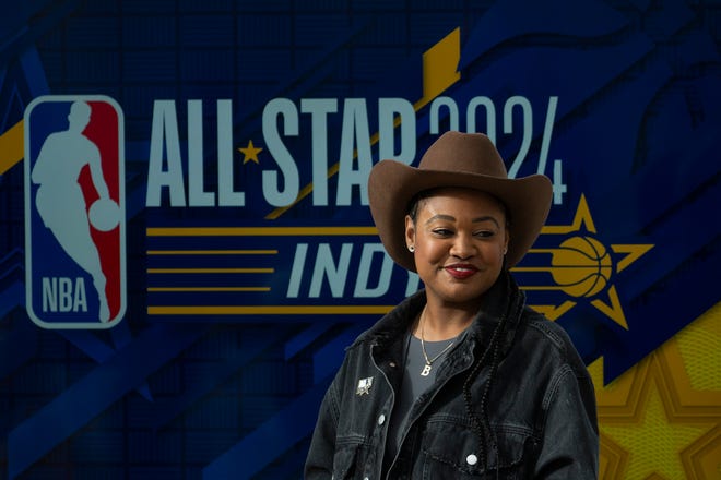 Mali Simone Bacon, GANGGANG Co-Founder and Executive Director, smiles to the crowd after announcing NBA All-Star 2024 arts and culture events at a press conference Wednesday, Jan. 17, 2024, at the Indianapolis Artsgarden.