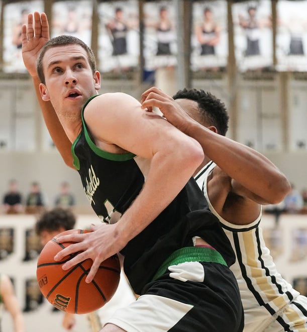 Westfield Shamrocks forward Nic Book (24) goes in for a lay-up Wednesday, Jan. 17, 2024, during the game at Noblesville High School in Noblesville. The Westfield Shamrocks defeated the Noblesville Millers, 58-54.