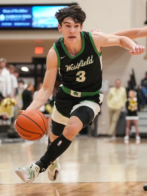 Westfield Shamrocks Trey Buchanan (3) rushes up the court Wednesday, Jan. 17, 2024, during the game at Noblesville High School in Noblesville. The Westfield Shamrocks defeated the Noblesville Millers, 58-54.