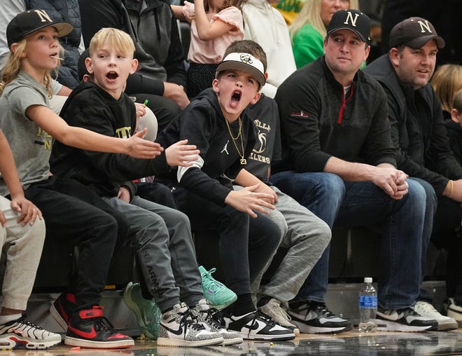 Noblesville Millers fans yell from the sidelines Wednesday, Jan. 17, 2024, during the game at Noblesville High School in Noblesville. The Westfield Shamrocks defeated the Noblesville Millers, 58-54.