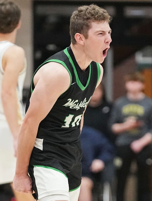 Westfield Shamrocks Will Harvey (10) yells in excitement after defeating the Noblesville Millers on Wednesday, Jan. 17, 2024, during the game at Noblesville High School in Noblesville. The Westfield Shamrocks defeated the Noblesville Millers, 58-54.