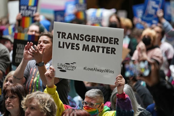 Hundreds attend a Rally to Protect Trans Youth organized by the ACLU of Indiana on Saturday, April 1, 2023, at the Statehouse in Indianapolis. The rally was held in response to the historic number of bills passing through the Statehouse that target the LGBTQ community.