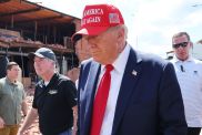 President Donald Trump prepares to leave after visiting Chez What Furniture store that was damaged during Hurricane Helene