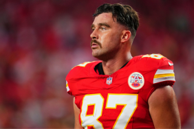 Travis Kelce #87 of the Kansas City Chiefs warms up before kickoff against the New Orleans Saints prior to an NFL football game at GEHA Field at Arrowhead Stadium on October 7, 2024 in Kansas City, Missouri.