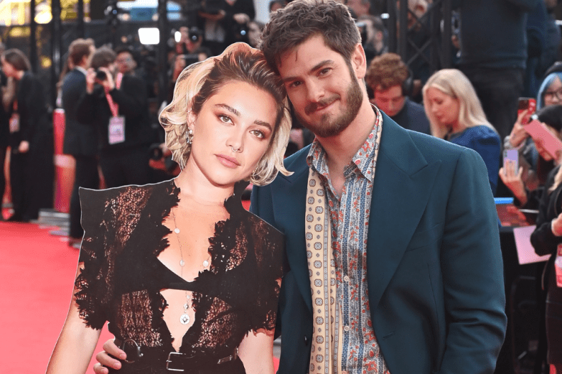 Andrew Garfield (R) poses with a cardboard cutout of Florence Pugh at the Headline Gala screening of "We Live In Time" during the 68th BFI London Film Festival at The Royal Festival Hall on October 16, 2024 in London, England.