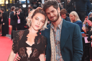 Andrew Garfield (R) poses with a cardboard cutout of Florence Pugh at the Headline Gala screening of "We Live In Time" during the 68th BFI London Film Festival at The Royal Festival Hall on October 16, 2024 in London, England.